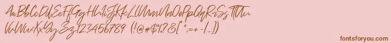 Just Kelly Justine Font – Brown Fonts on Pink Background