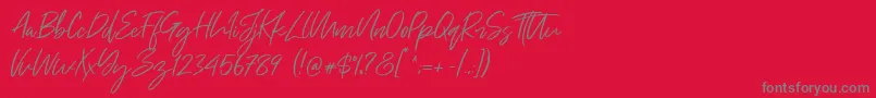 Just Kelly Justine Font – Gray Fonts on Red Background