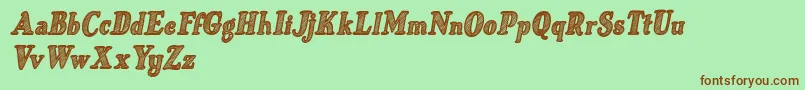 フォントJust Mandrawn Italic – 緑の背景に茶色のフォント