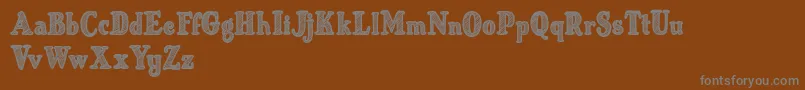 More about Just Mandrawn Font Just Mandrawn Font – Gray Fonts on Brown Background