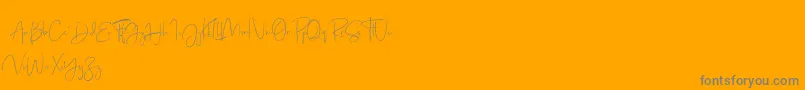 fuente Just Sunday Demo – Fuentes Grises Sobre Fondo Naranja