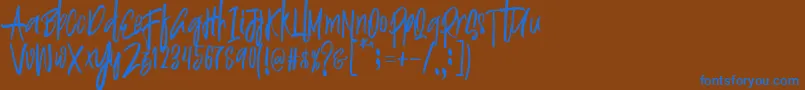 Justin Brush Font Font – Blue Fonts on Brown Background