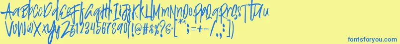 Czcionka Justin Brush Font – niebieskie czcionki na żółtym tle