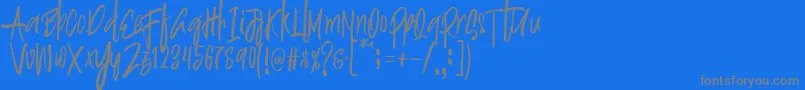 Justin Brush Font Font – Gray Fonts on Blue Background
