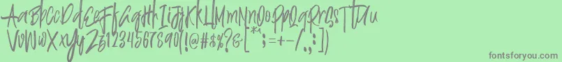 Justin Brush Font Font – Gray Fonts on Green Background