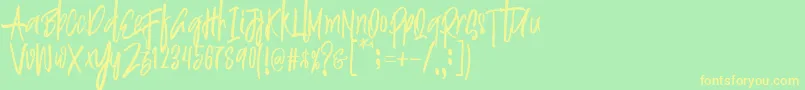 Justin Brush Font Font – Yellow Fonts on Green Background