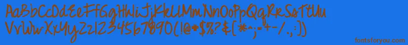 JustRealizeBold Font – Brown Fonts on Blue Background