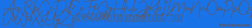 JustwinchSignatureDemo Font – Brown Fonts on Blue Background