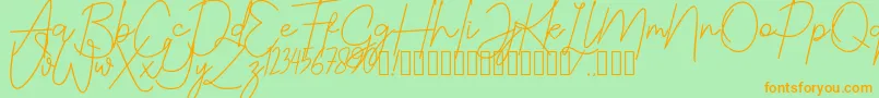 Шрифт JustwinchSignatureDemo – оранжевые шрифты на зелёном фоне