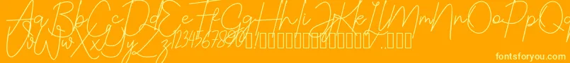 Czcionka JustwinchSignatureDemo – żółte czcionki na pomarańczowym tle