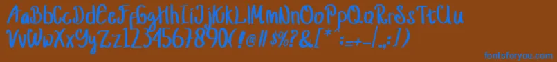 jusy Font – Blue Fonts on Brown Background