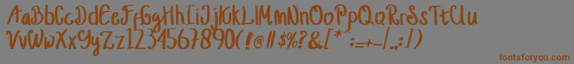 jusy Font – Brown Fonts on Gray Background