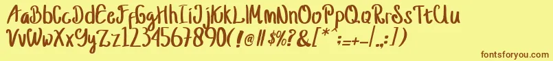 jusy Font – Brown Fonts on Yellow Background