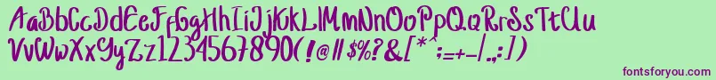 jusy Font – Purple Fonts on Green Background