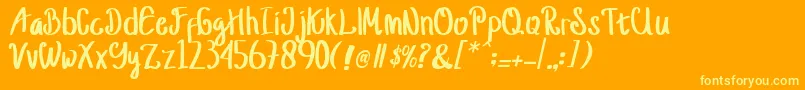 jusy Font – Yellow Fonts on Orange Background