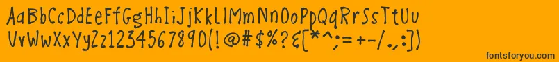 Czcionka K26BonVoyage – czarne czcionki na pomarańczowym tle