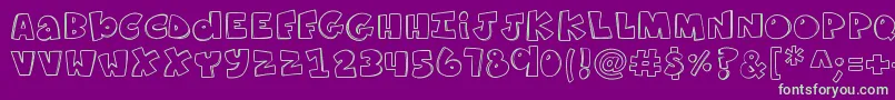 K26ComicKats Font – Green Fonts on Purple Background