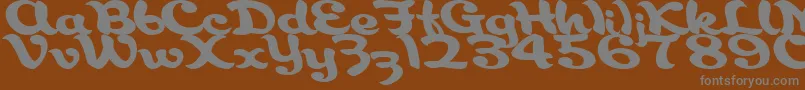 フォントAborigianlRegularTtstd – 茶色の背景に灰色の文字