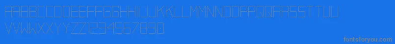 Kacugak   demo version-Schriftart – Graue Schriften auf blauem Hintergrund