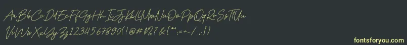 フォントKadung Tresno – 黒い背景に黄色の文字