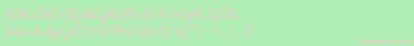 Kaftice-Schriftart – Rosa Schriften auf grünem Hintergrund