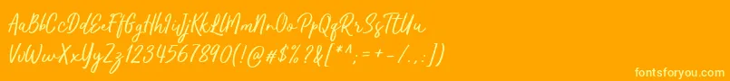 Kaftice-Schriftart – Gelbe Schriften auf orangefarbenem Hintergrund