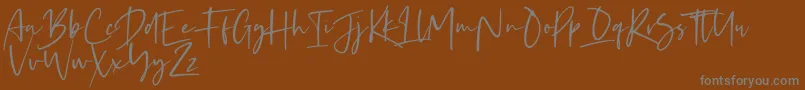 Kaileigh 2-Schriftart – Graue Schriften auf braunem Hintergrund