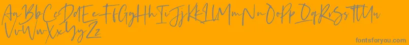 Kaileigh 2-Schriftart – Graue Schriften auf orangefarbenem Hintergrund