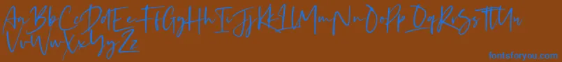 Kaileigh-Schriftart – Blaue Schriften auf braunem Hintergrund