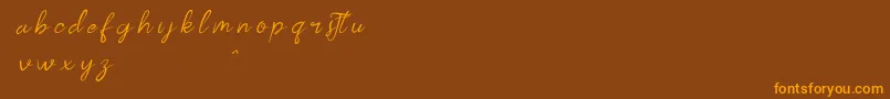 kalilademo Font – Orange Fonts on Brown Background