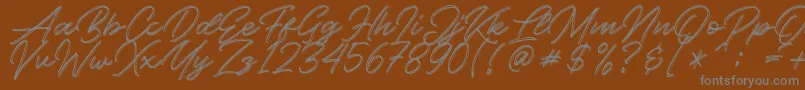 Weitere Informationen zur Kallisa-Schriftart Kallisa-Schriftart – Graue Schriften auf braunem Hintergrund