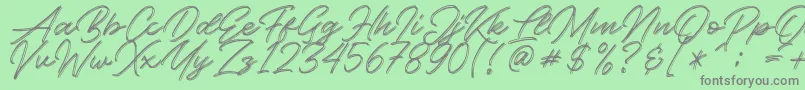 フォントKallisa – 緑の背景に灰色の文字