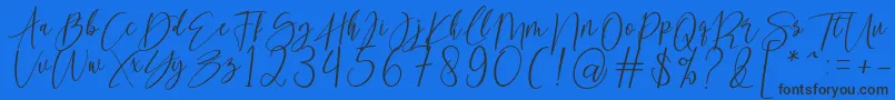 Czcionka kallita – czarne czcionki na niebieskim tle