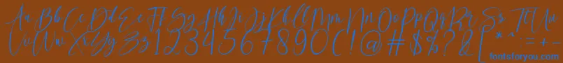Czcionka kallita – niebieskie czcionki na brązowym tle