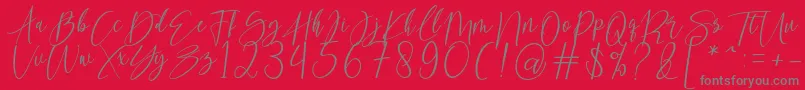 kallita Font – Gray Fonts on Red Background