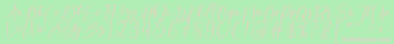 kallita-fontti – vaaleanpunaiset fontit vihreällä taustalla
