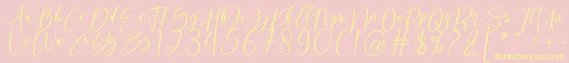 kallita-Schriftart – Gelbe Schriften auf rosa Hintergrund