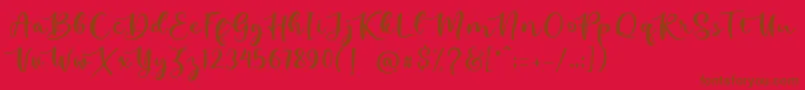 kallithea -Schriftart – Braune Schriften auf rotem Hintergrund