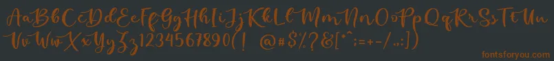 kallithea-fontti – ruskeat fontit mustalla taustalla
