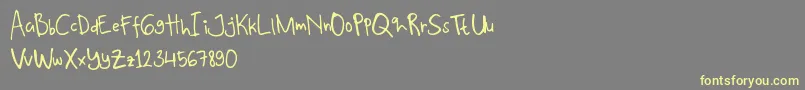 Weitere Informationen zur Kalyana Demo-Schriftart Kalyana Demo-Schriftart – Gelbe Schriften auf grauem Hintergrund