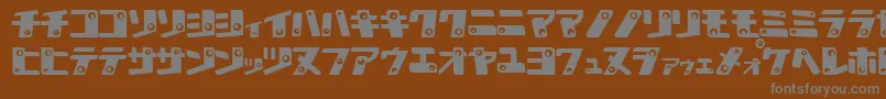 フォントKAN K    – 茶色の背景に灰色の文字