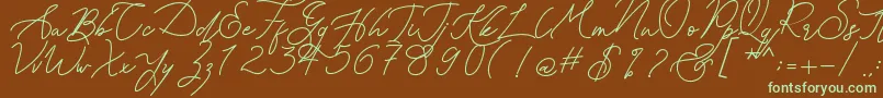 フォントKanaggawa – 緑色の文字が茶色の背景にあります。