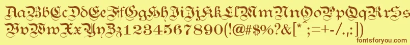 フォントKANZL    – 茶色の文字が黄色の背景にあります。