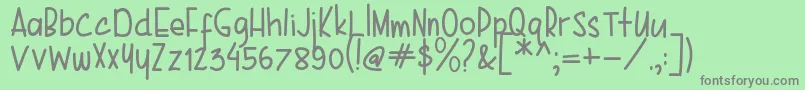 Karenina Handwriting Font – Gray Fonts on Green Background