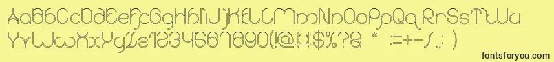 karitza Hollow-Schriftart – Schwarze Schriften auf gelbem Hintergrund