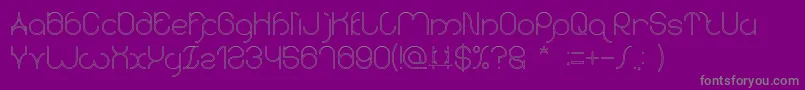 karitza Hollow-fontti – harmaat kirjasimet violetilla taustalla