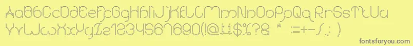 karitza Hollow Font – Gray Fonts on Yellow Background