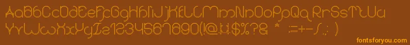 karitza Hollow Font – Orange Fonts on Brown Background
