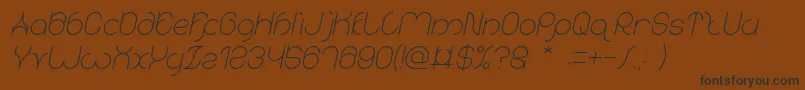 karitza Italic Font – Black Fonts on Brown Background
