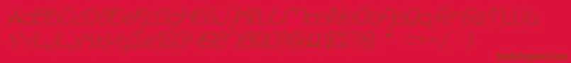 karitza Italic Font – Brown Fonts on Red Background